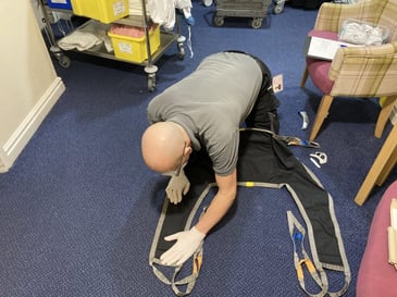 Our servicing engineer ensuring that care equipment is being regularly serviced in a care home.