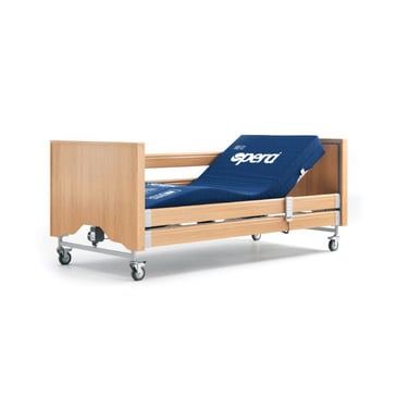 Adjustable profiling care bed with pressure-relieving mattress on castors, designed for safe and comfortable resident support.